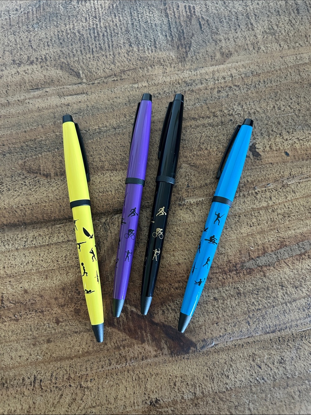 Set of 4 Sport Icon Ballpoint Pens - Yellow, Purple, Black, Blue 1996  pens